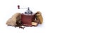 Pile of coffee beans, coffee grinder, ground coffee on a white background. Top view. Banner