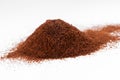 Pile of coffee powder isolated on white Royalty Free Stock Photo