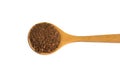 Pile of coffee powder in wooden spoon isolated on white background Royalty Free Stock Photo