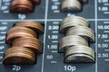 Pile of coins in cash register Royalty Free Stock Photo