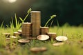 Pile of Coins on Lush Green Field, Wealth in Nature, Stacked gold coins on the grass with little plants growing on the coin stack Royalty Free Stock Photo