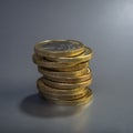 Pile of coins is one euro on a dark gray background. Royalty Free Stock Photo