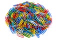 Pile of colored paper clips on isolated white background. Close up view Royalty Free Stock Photo