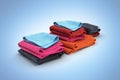 Pile of colored towels isolated on blue gradient background 3d Royalty Free Stock Photo