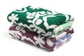 Pile of colored towels isolated on white background Royalty Free Stock Photo
