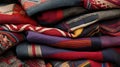 A pile of colorful blankets with different patterns and colors. Royalty Free Stock Photo