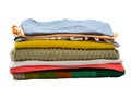 Pile of colorful clean folded clothes isolated on white Royalty Free Stock Photo