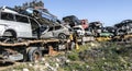 Pile of colorful discarded cars on junkyard in israel Royalty Free Stock Photo