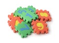 Pile of colorful foam math numbers puzzle pieces