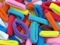 A pile of colorful hair elastic bands, close-up