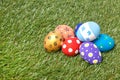 Pile of colorful handmade easter eggs on grass Royalty Free Stock Photo