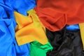 Pile of colorful silk fabrics. Crumpled patches of vibrant color Royalty Free Stock Photo