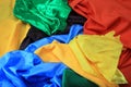 Pile of colorful silk fabrics. Crumpled patches of vibrant color Royalty Free Stock Photo
