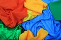 Pile of colorful silk fabrics. Crumpled patches of vibrant color Royalty Free Stock Photo