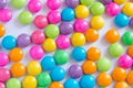 Pile of colorful sweet candy chocolates coated on white paper. c Royalty Free Stock Photo