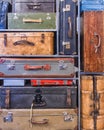 Pile of colorful vintage suitcases