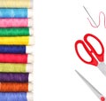 Pile of coloured bobbins of lurex thread and red scissors isolated on white Royalty Free Stock Photo