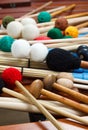 Pile of coloured mallets and sticks