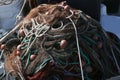 Pile of commercial fishing net with cords and floats Royalty Free Stock Photo