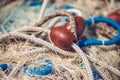 Pile of commercial fishing net with cords and floats Royalty Free Stock Photo