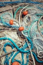 Pile of commercial fishing net with cords and floats Royalty Free Stock Photo