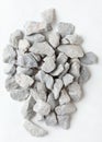 Pile of construction gravel stone lie in group, gray rock gravel show close up texture and dust, object design. White background Royalty Free Stock Photo