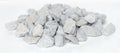 Pile of construction gravel stone lie in group, gray rock gravel show close up texture and dust, object design. White background Royalty Free Stock Photo