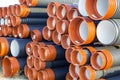 Pile of corrugated PVC sewer or drain pipes