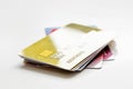 Pile of credit cards on white background