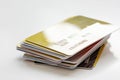 Pile of credit cards on white background