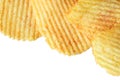 A pile of crinkle cut potato crisps Royalty Free Stock Photo