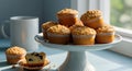 Pile of crumble-topped muffins on a cake stand Royalty Free Stock Photo