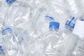 Pile of crumpled plastic bottles as background, closeup. Royalty Free Stock Photo