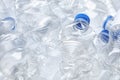 Pile of crumpled plastic bottles as background, closeup. Royalty Free Stock Photo