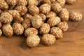 A Pile of Crunchy Asian Sesame Peanuts with Soy Sauce on a Wooden Counter Royalty Free Stock Photo