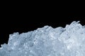 Pile of crushed ice cubes on dark background with copy space. Cr Royalty Free Stock Photo