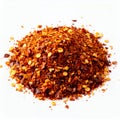 Pile of crushed red pepper flakes, culinary spice ingredient element on white background Royalty Free Stock Photo