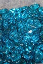 Pile of crystal clear blue glass stones close-up Royalty Free Stock Photo