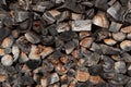 Pile of cut wood as background, texture. Firewood, black and white image Royalty Free Stock Photo