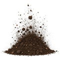 A pile of dark rich soil with particles exploding upwards isolated on white background Royalty Free Stock Photo