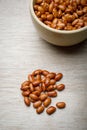 Pile of dark speckled kidney beans in bowl. Top view Royalty Free Stock Photo