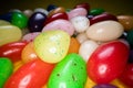 Pile of delicious colourful chewing candies background. Colourful sweets on yellow background Royalty Free Stock Photo