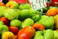 Pile of tomatoes on display at a local market