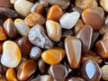 A pile of different colored stones sitting on top of each other Royalty Free Stock Photo