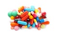 Pile of different colorful pills on white, above view Royalty Free Stock Photo