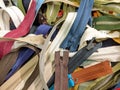 A heap of different coloured zips and zippers Royalty Free Stock Photo