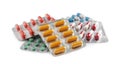 Pile of different pills in blister packs on white background Royalty Free Stock Photo