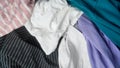 Pile of different used clothes texture background