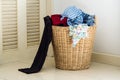 Pile of dirty clothes in washing basket Royalty Free Stock Photo