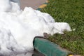 A pile of dirty snow lying on the road Royalty Free Stock Photo